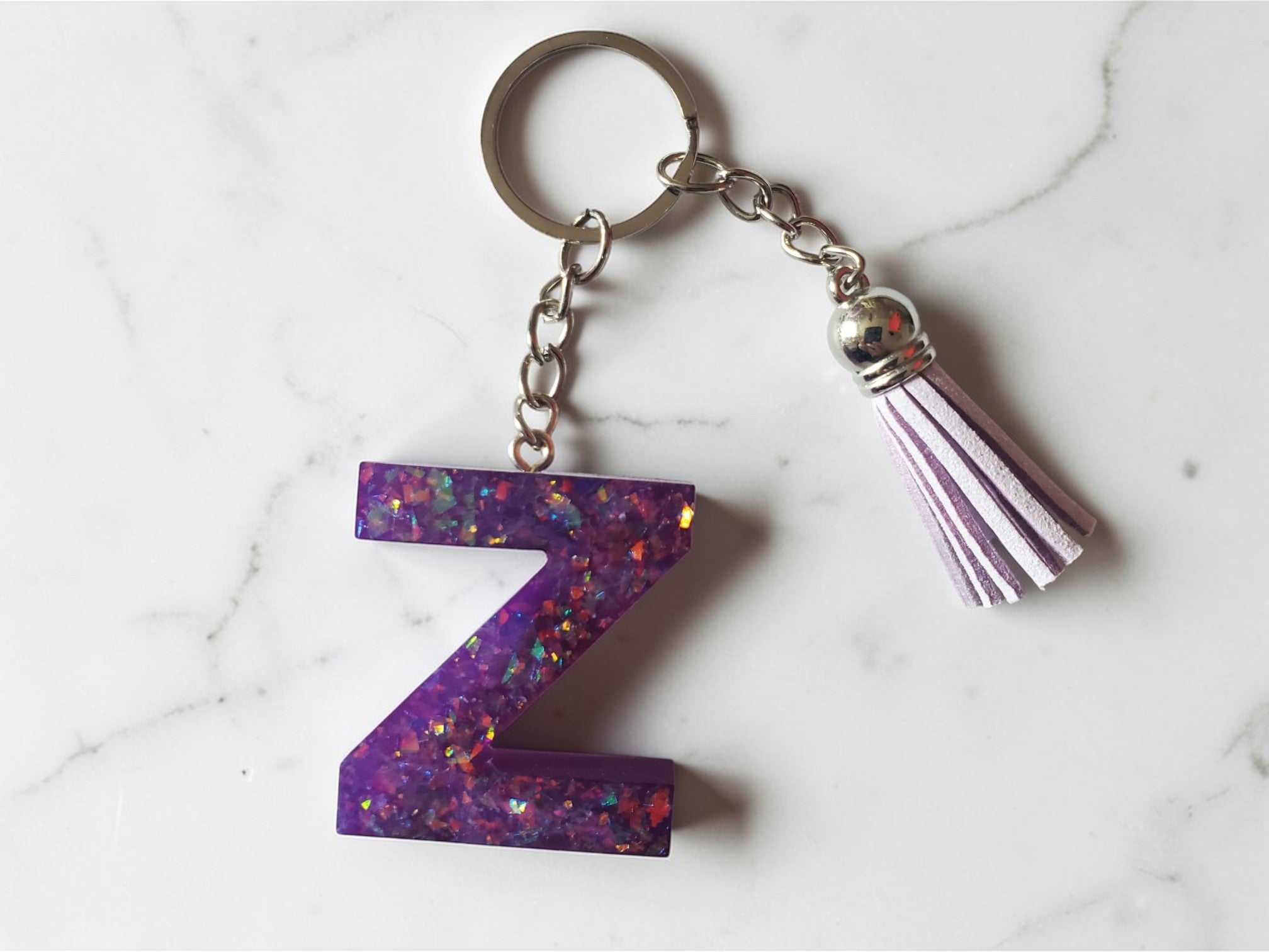 Porte-clé lettre avec pompon