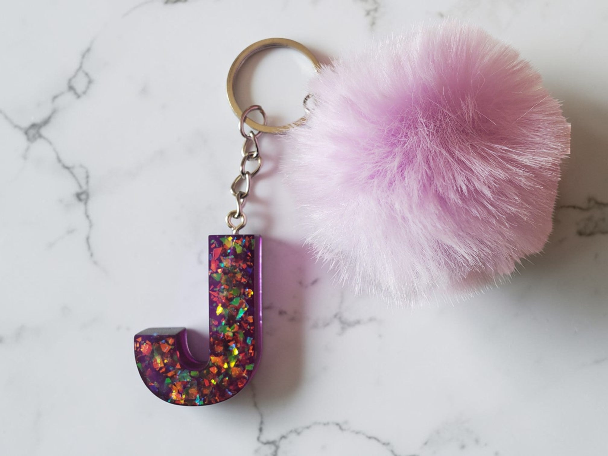 Porte-clé lettre avec pompon