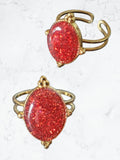Bague à paillettes rouges et or