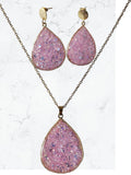 Parure collier et boucles d'oreilles pailletés