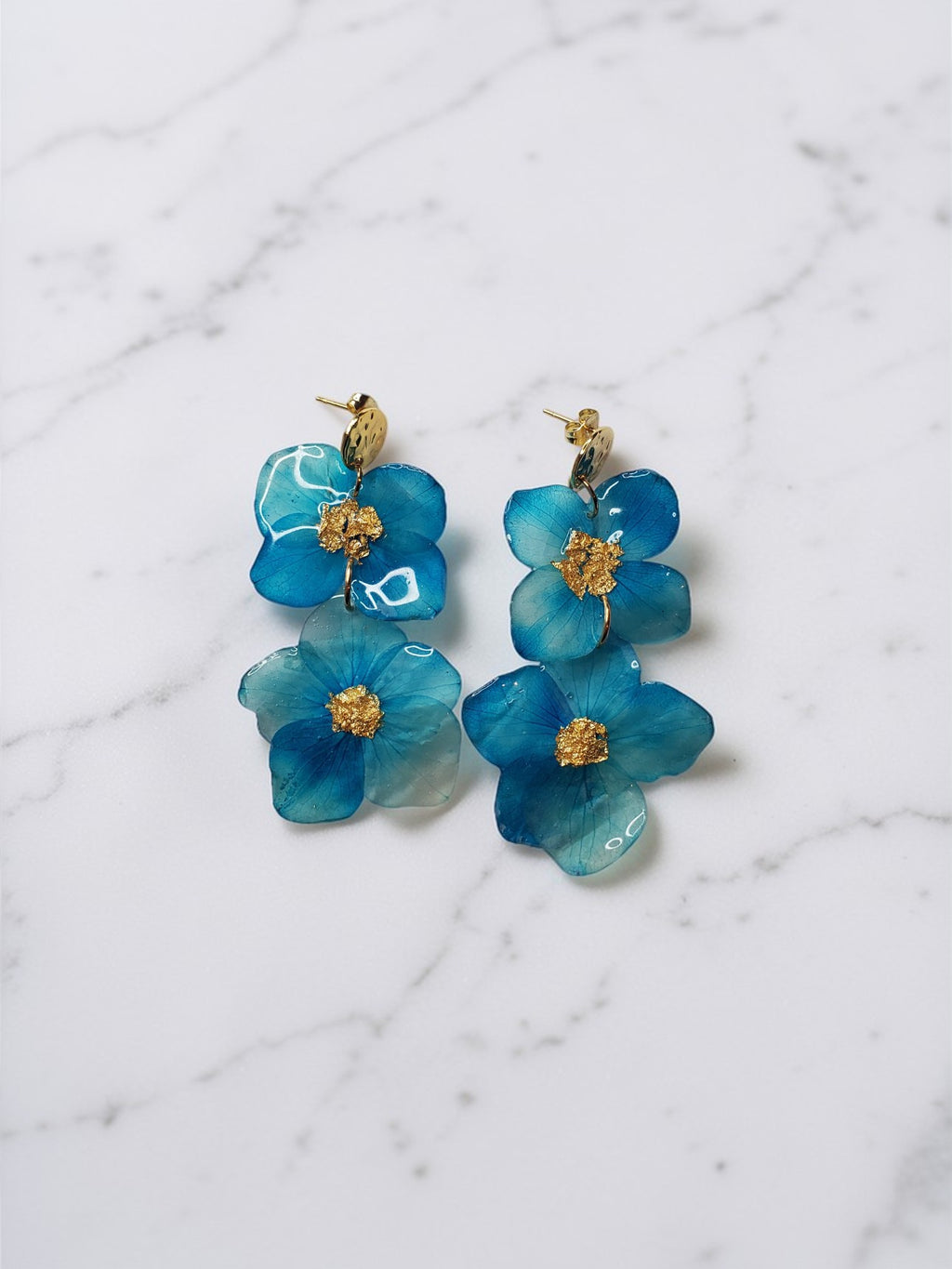 Boucles d’oreilles en fleurs naturelles sous résine