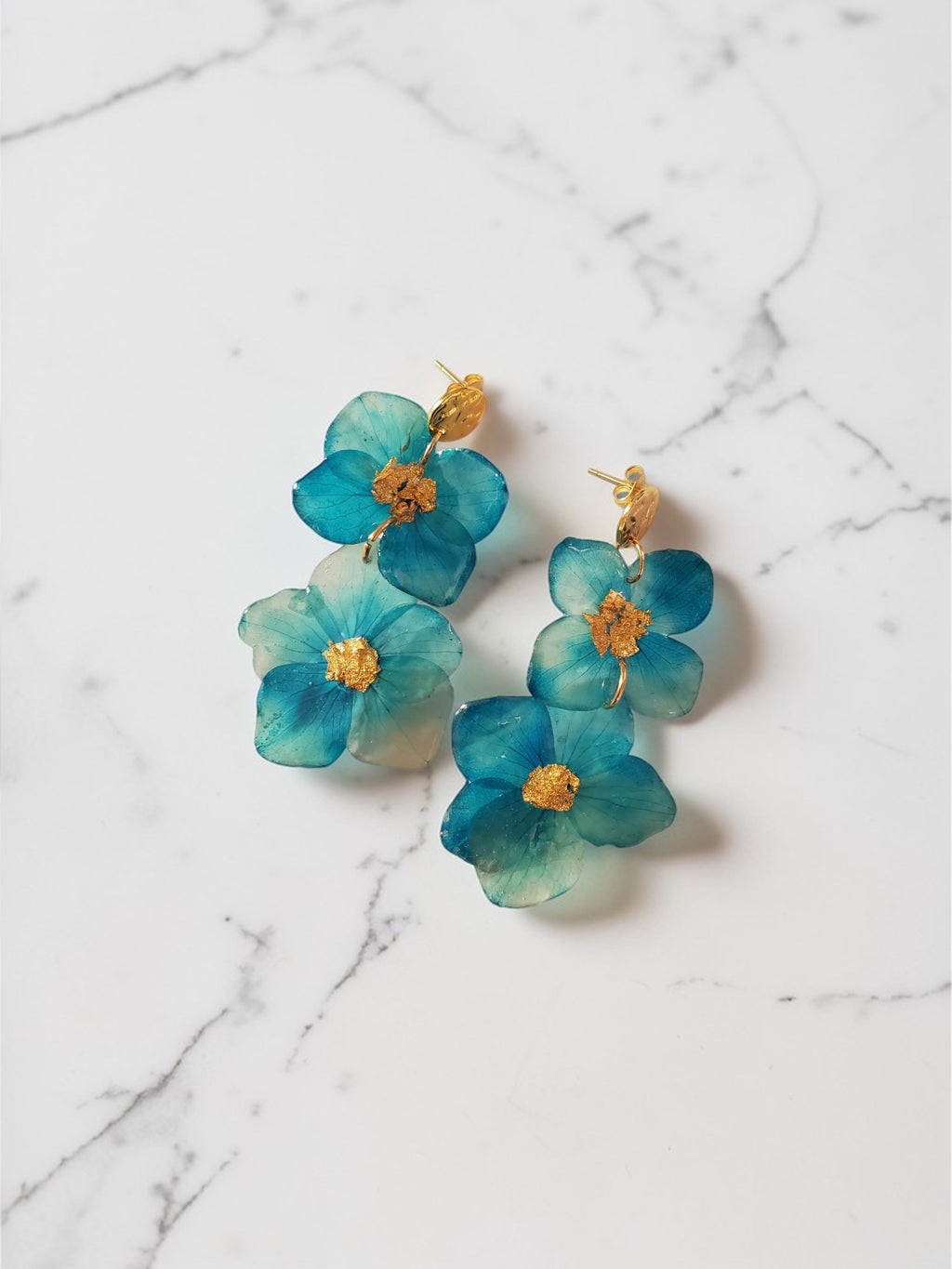 Boucles d’oreilles en fleurs naturelles sous résine